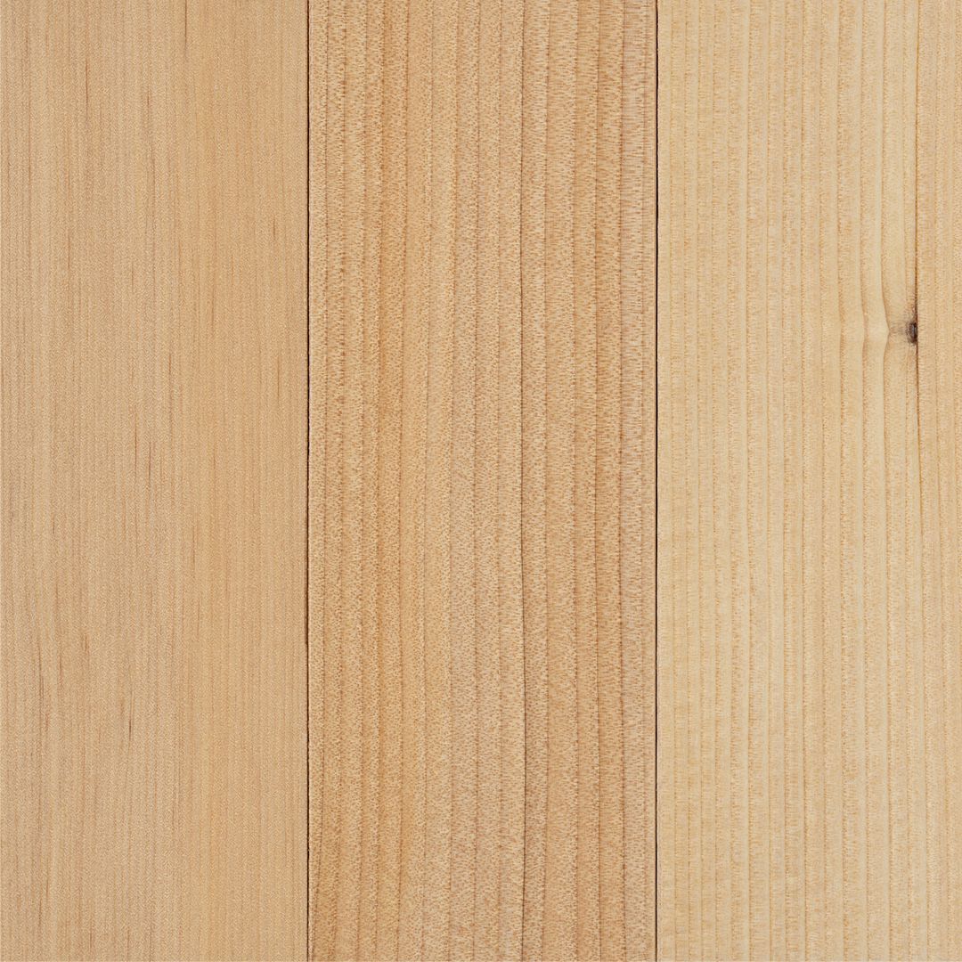Light tan wooden boards with visible grain and vertical seams
