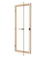 Clear glass shower door with chrome hinges and handle on a beige frame
