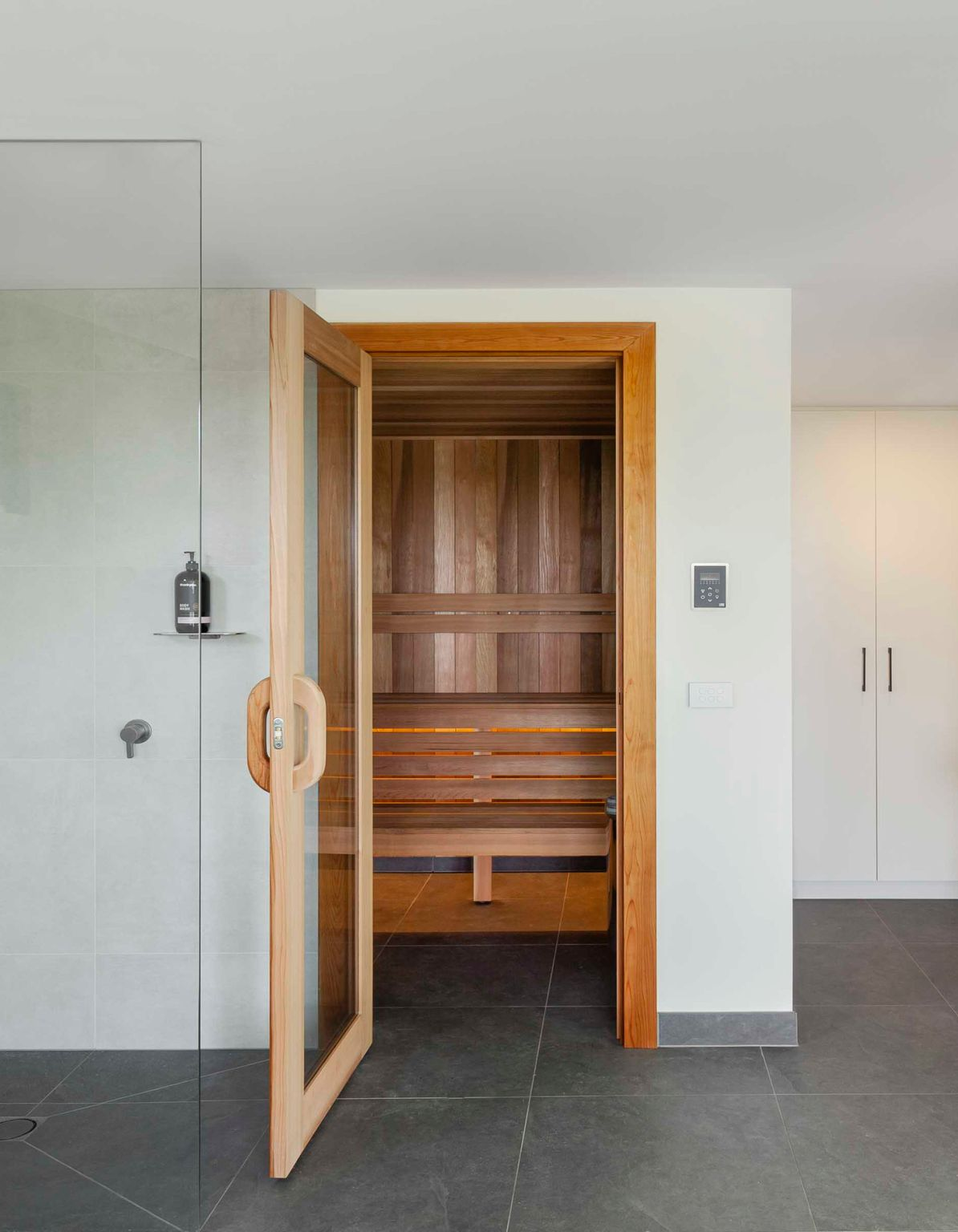 Custom traditional home sauna installation in Victoria featuring SAWO Western Red Cedar Sauna