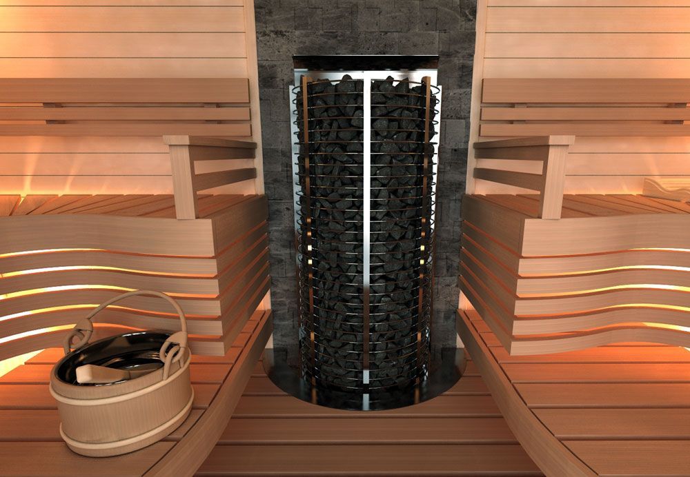 Modern sauna interior with wooden benches and a central black stone heater under warm lighting