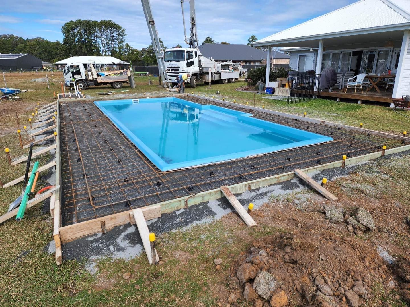 Pool Construction: Rectangular Blue Pool in a Concrete Frame — Clearwater Pools Hallidays Point in Diamond Beach, NSW