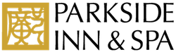 a logo for parkside inn and spa with a tree in the middle