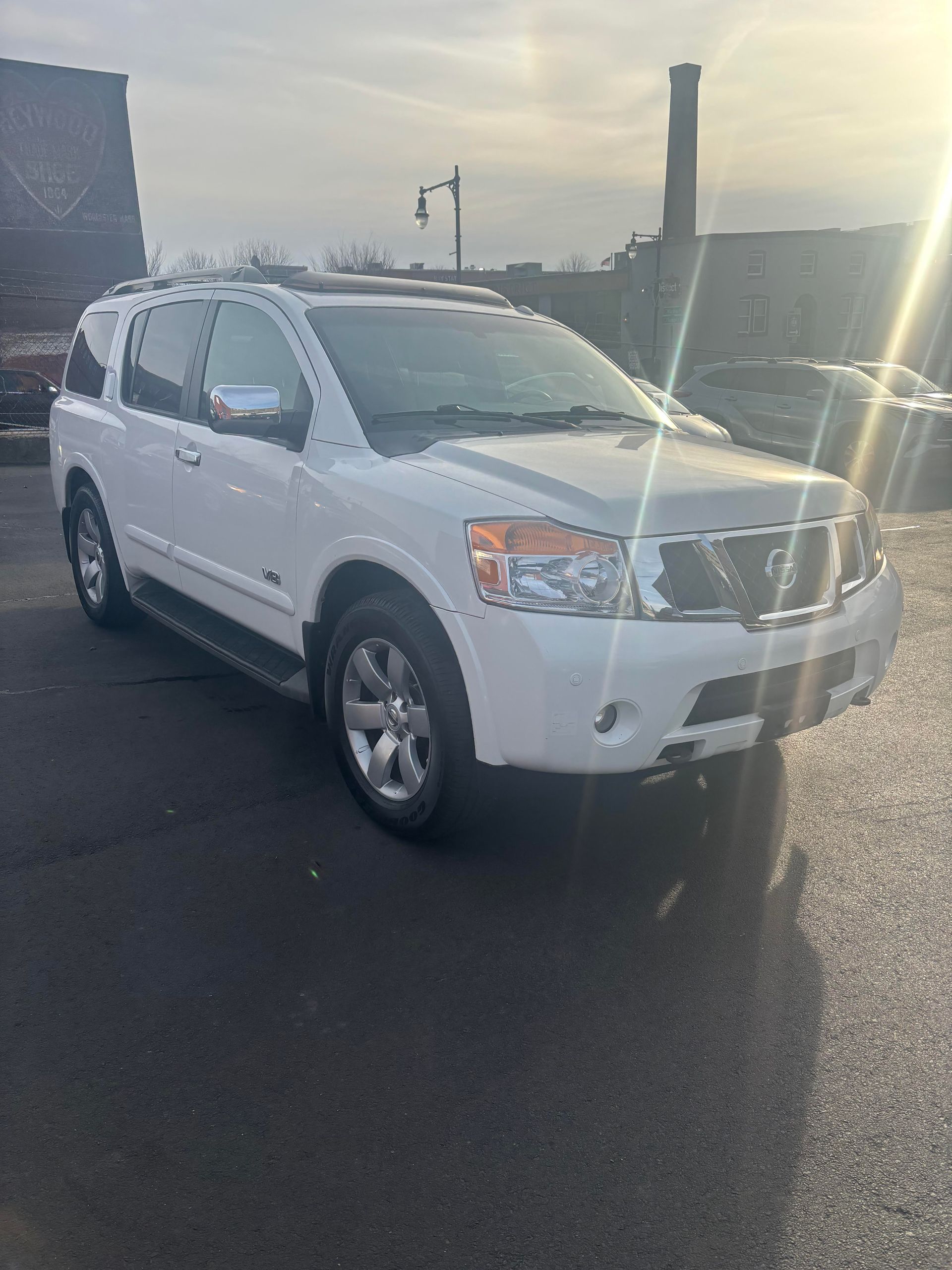 Used white Nissan Armada for sale at Lou’s Custom Exhaust Worcester MA