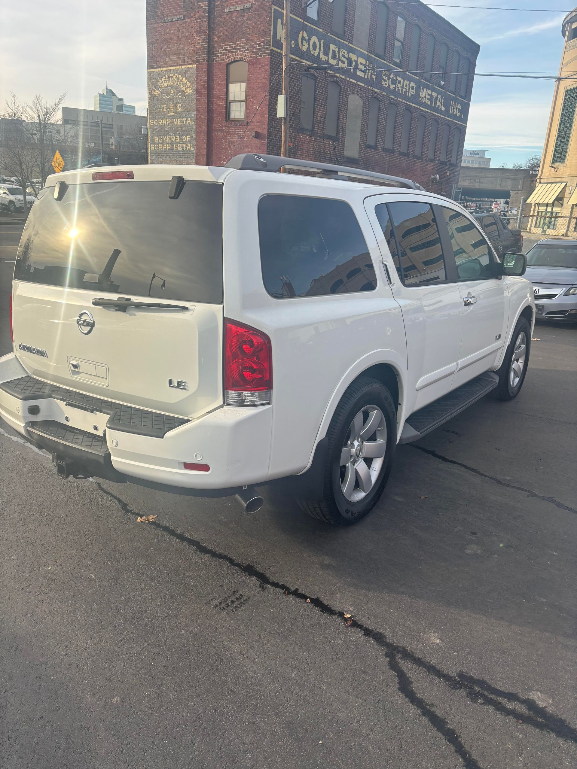 White Nissan Armada SUV available at Lou’s Custom Exhaust Worcester MA