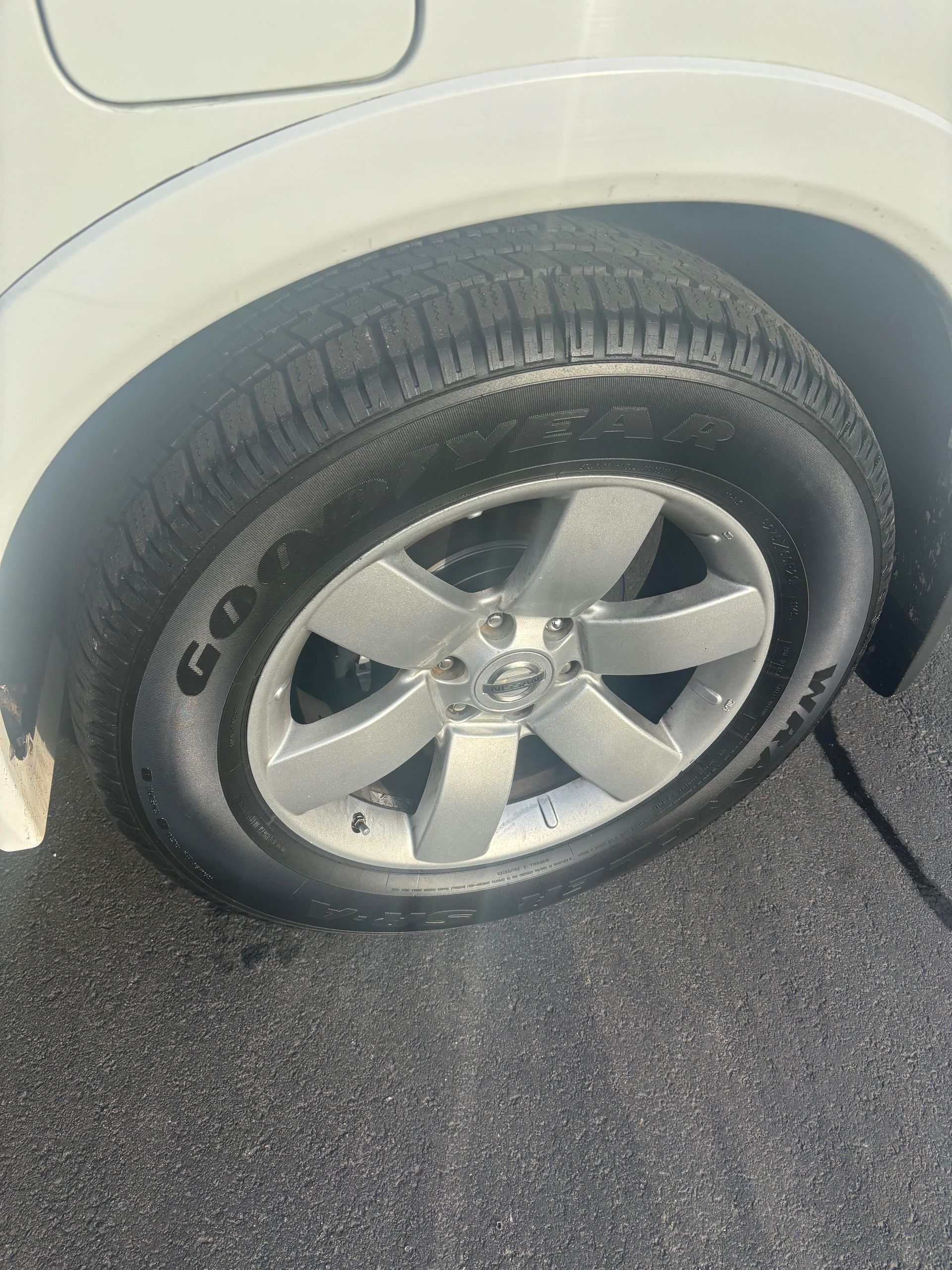 Nissan Armada wheel and tire close-up at Lou’s Custom Exhaust Worcester MA