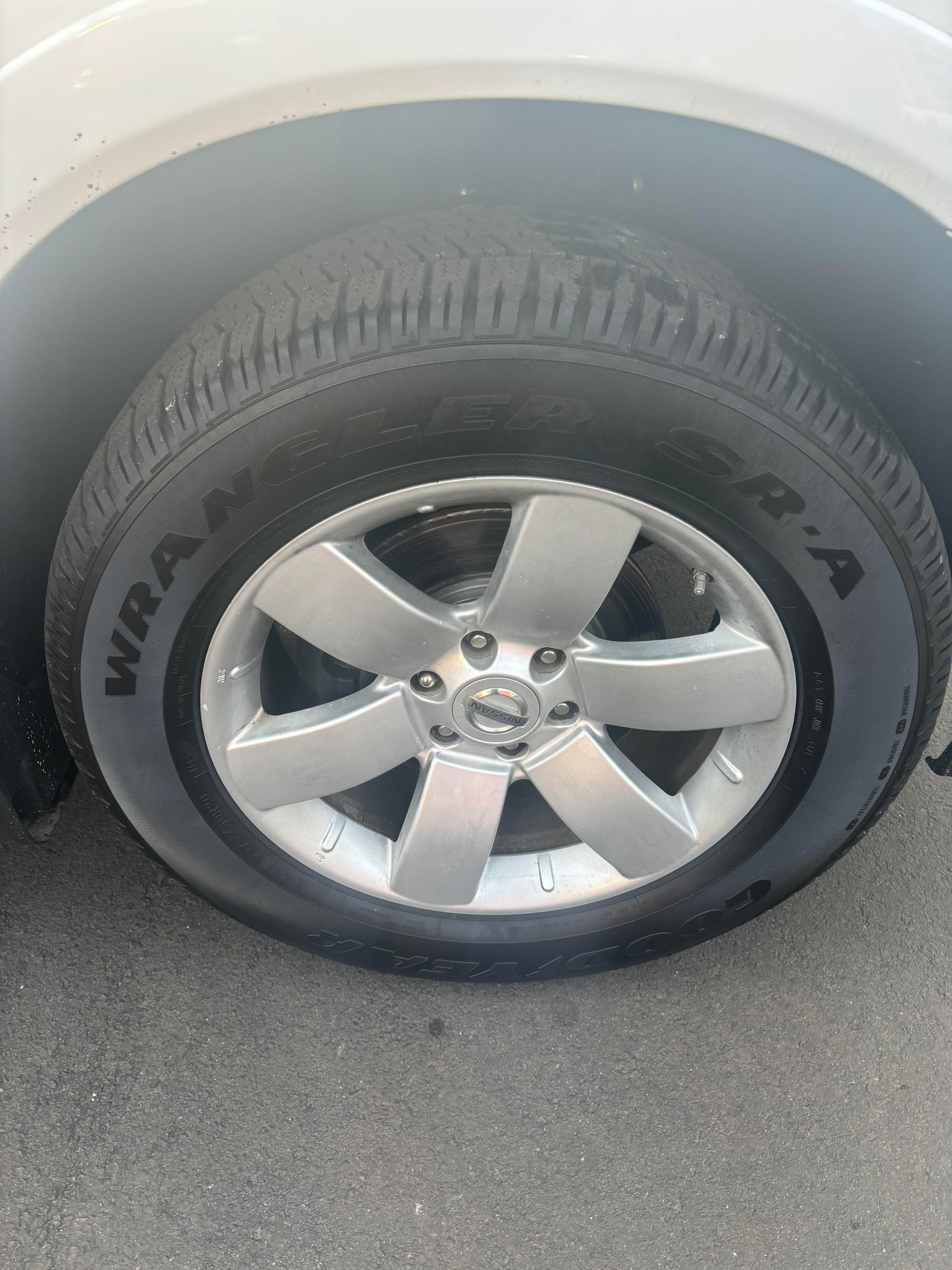 Detailed view of Nissan Armada tire tread at Lou’s Custom Exhaust Worcester MA