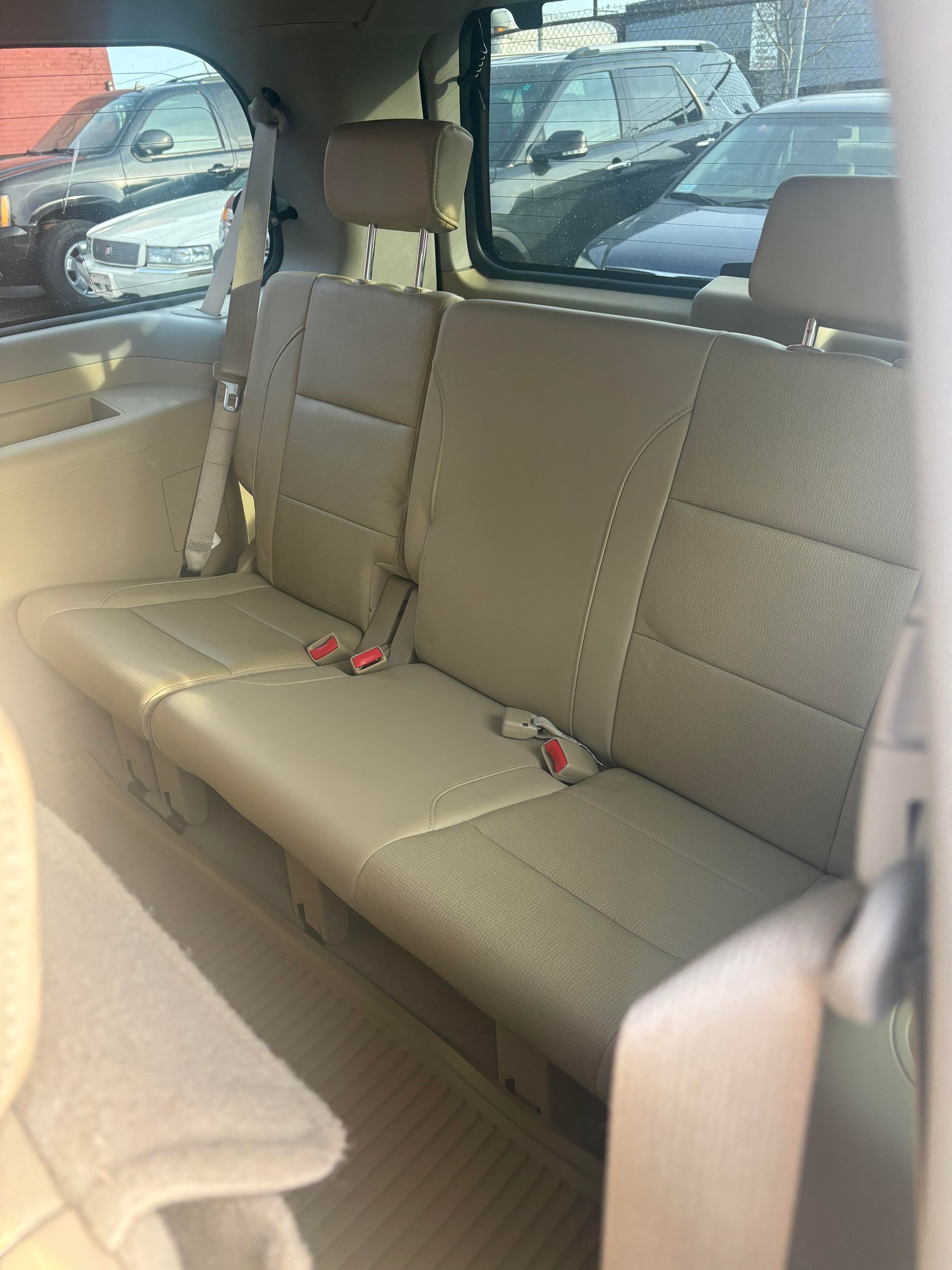 Rear passenger seats in Nissan Armada SUV for sale at Lou’s Custom Exhaust Worcester MA