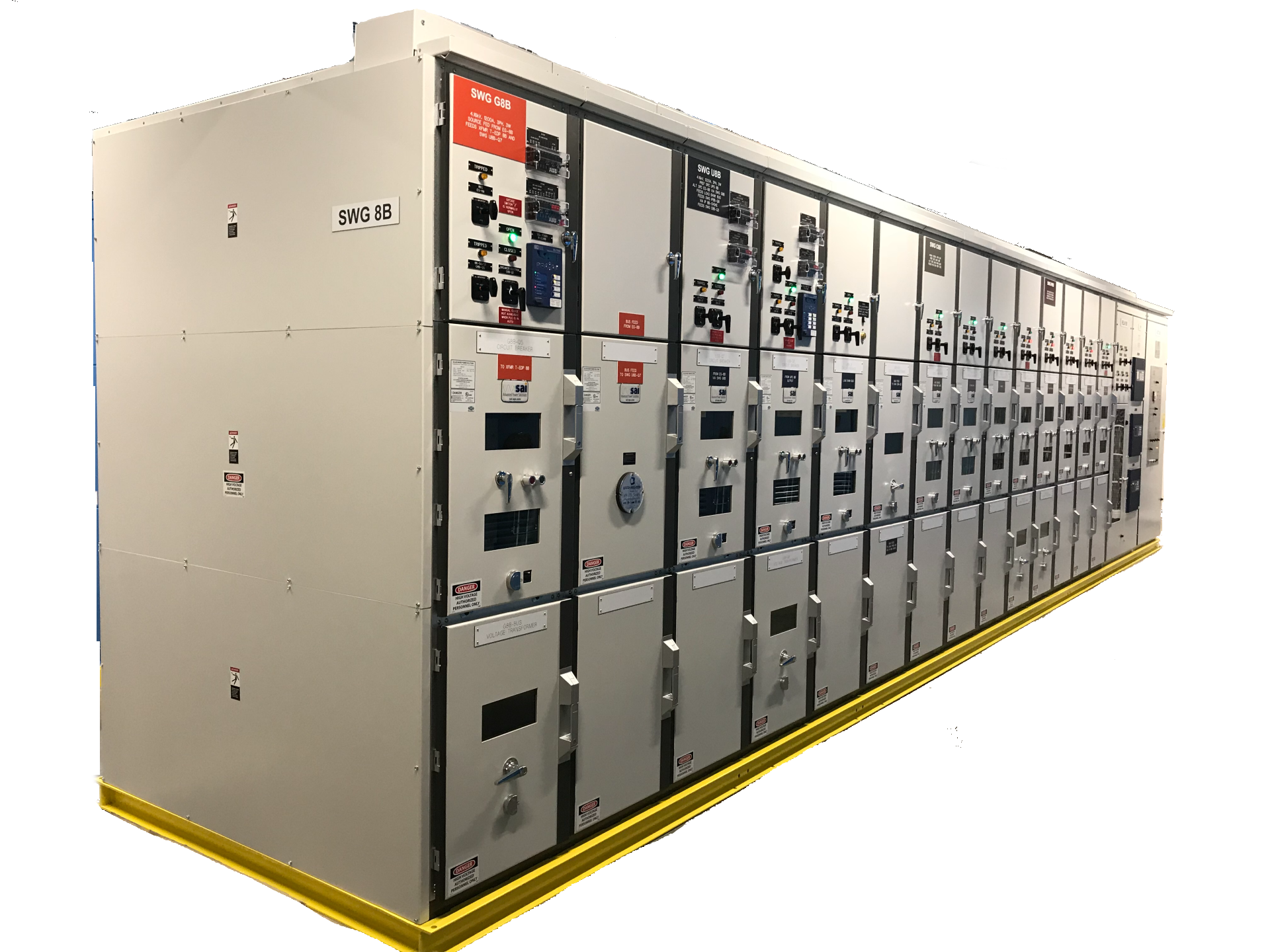 Row of gray electrical switchgear cabinets in an industrial facility