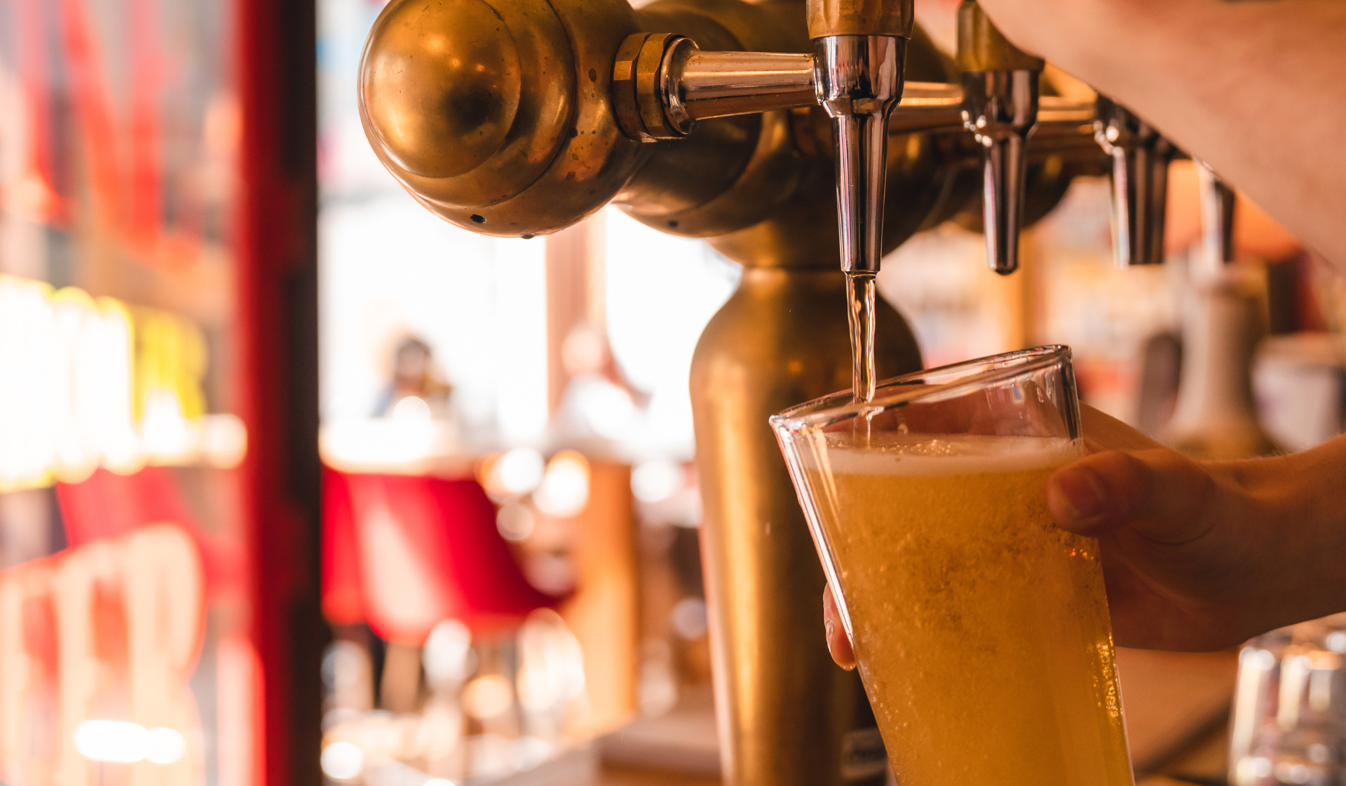 Beer being poured on tap during happy hour, 4 to 6