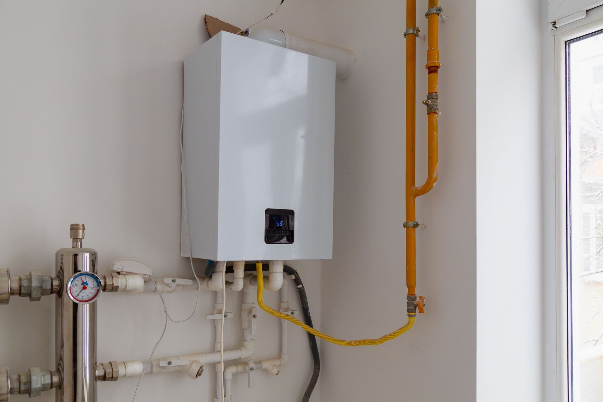 White Modern Gas Boiler in a Home | Pleasant Hill, CA - Ernie’s Plumbing & Sewer Service