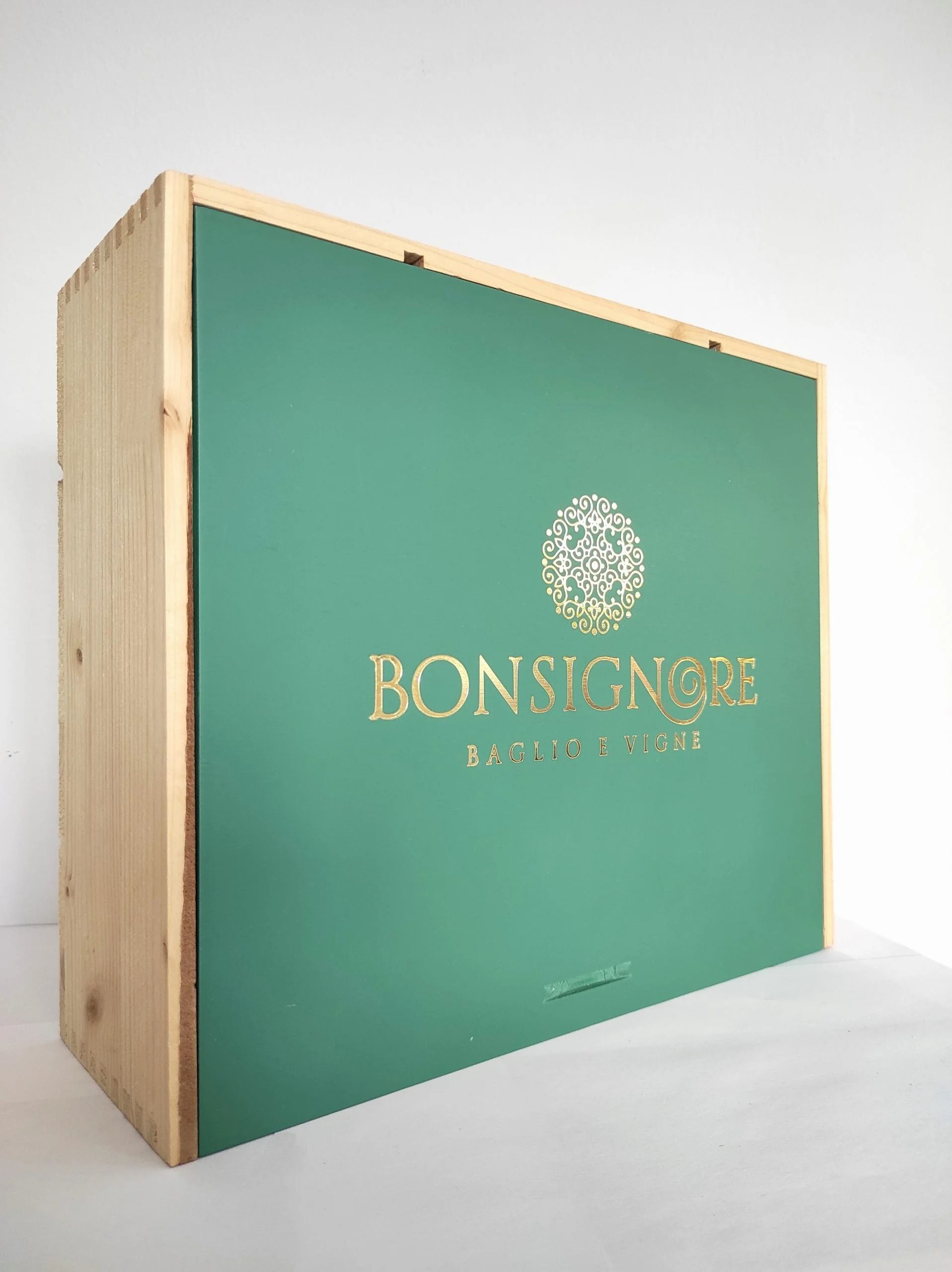 Scatola da forno verde Bonsignore con logo dorato, mostrata su sfondo chiaro.