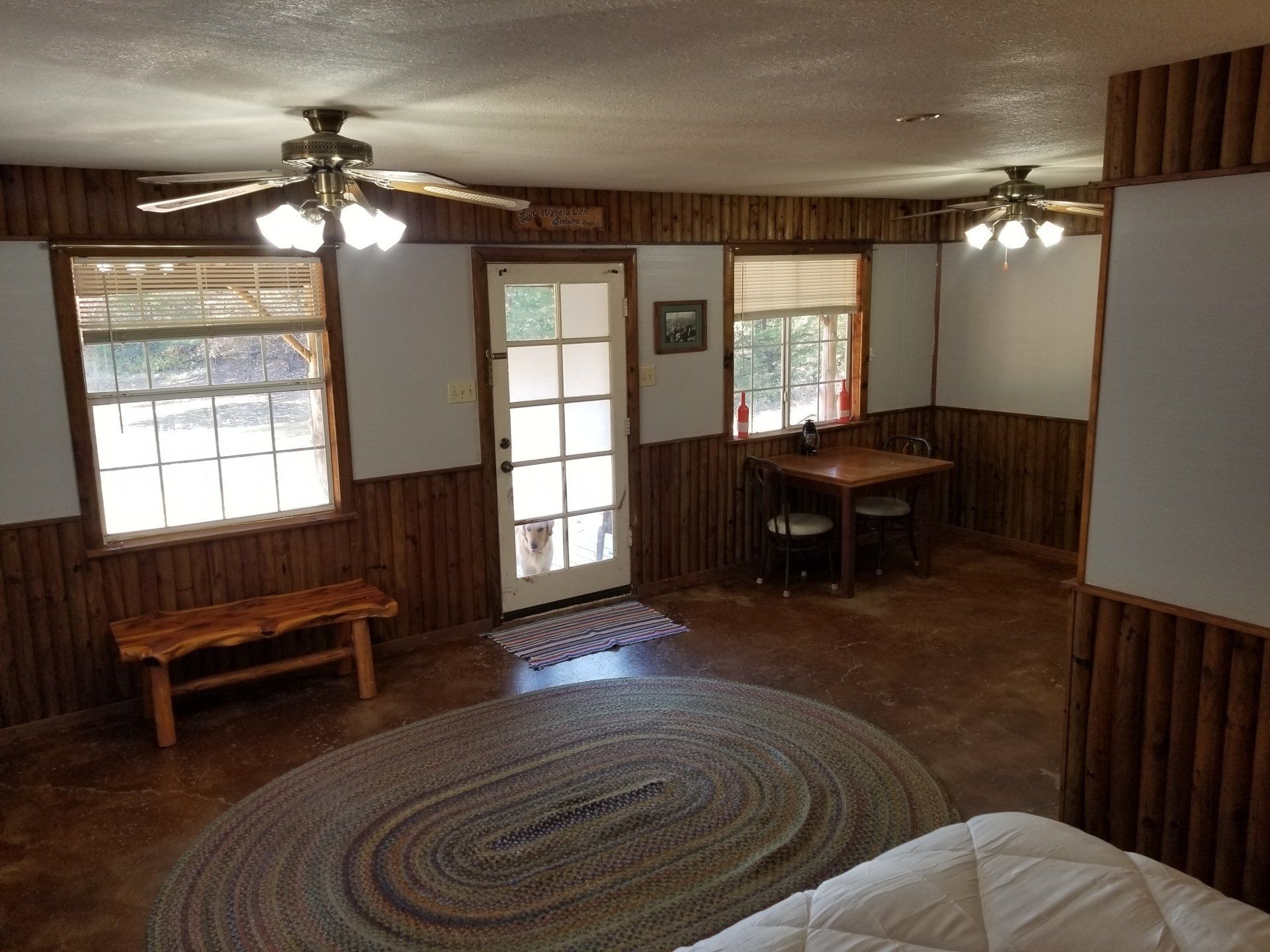 Bedroom with door and windows
