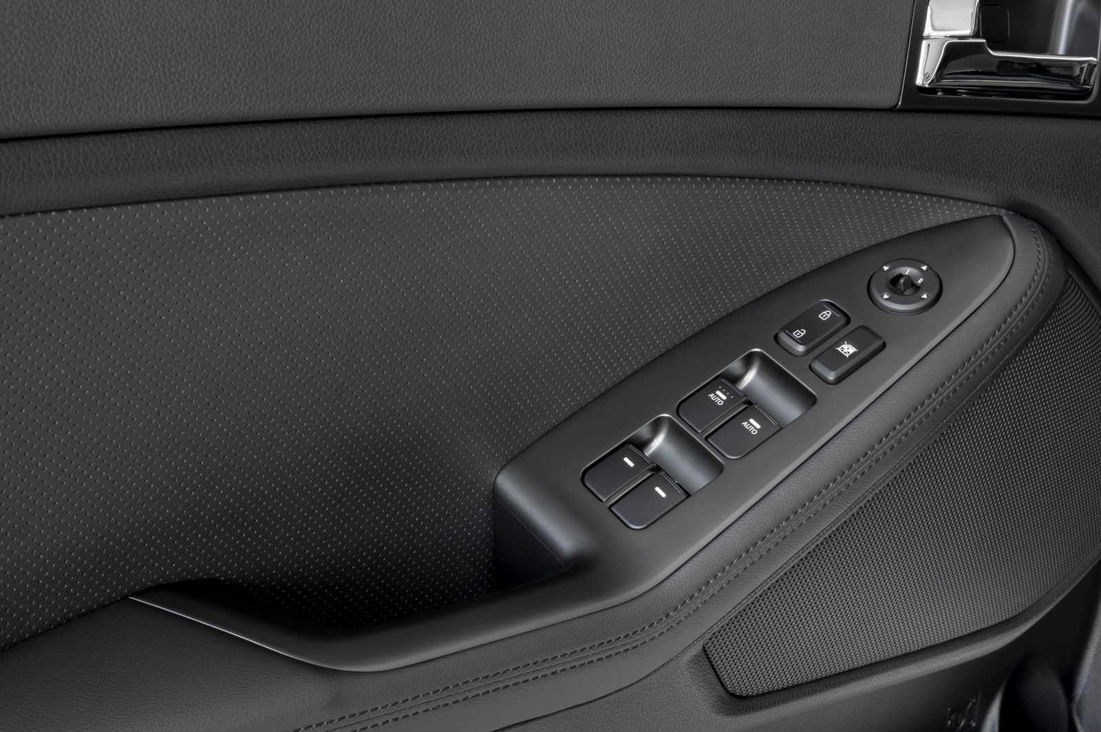 Car door interior with power window and mirror controls.