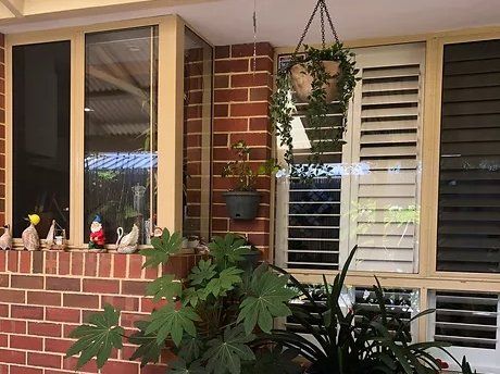 Wooden Window With White Facade — Joondalup, WA — Sure Secure