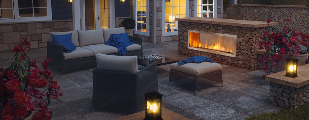 Backyard patio with outdoor fireplace and evening seating area