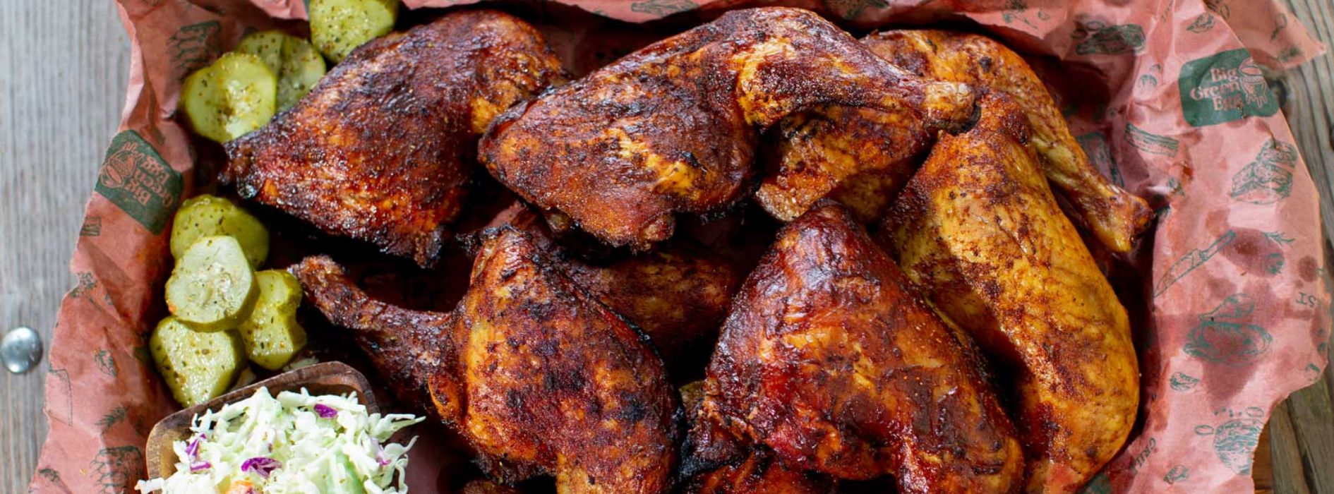 Applewood-smoked barbecue chicken glazed with Kansas City style sauce on a Big Green Egg grill