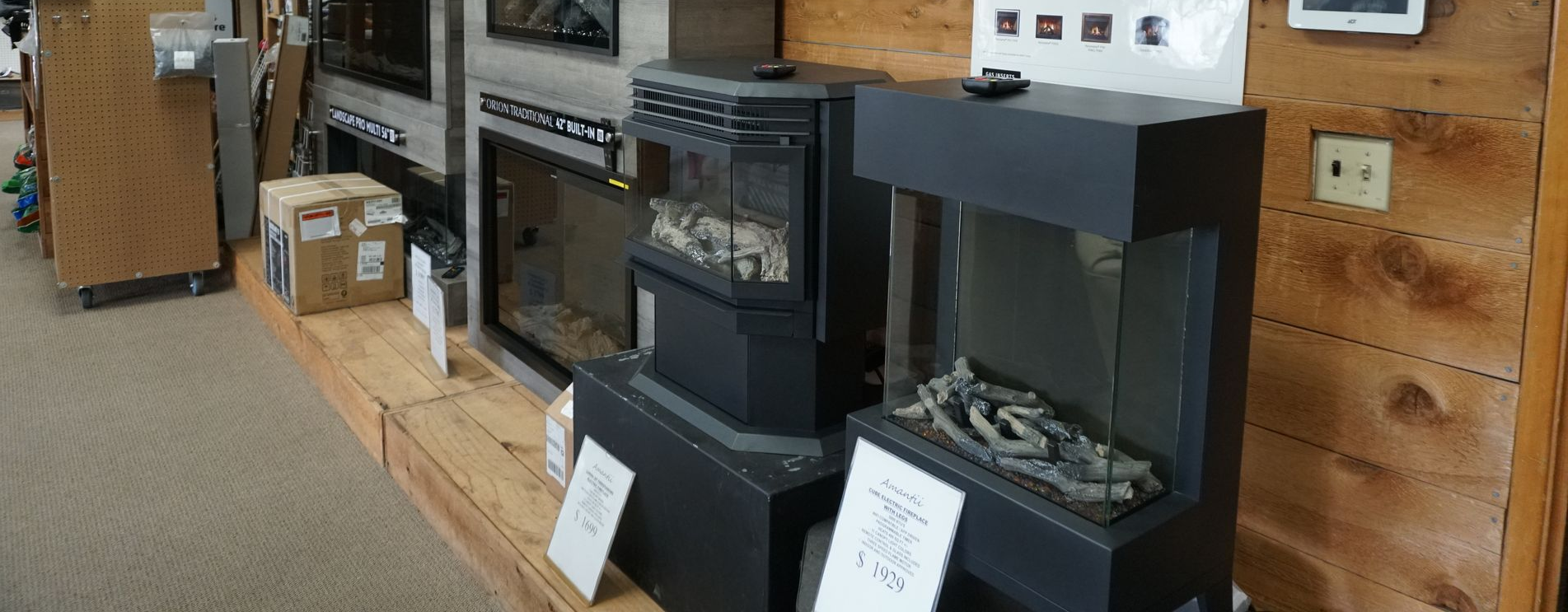 Gas fireplace and stove displays inside the Olympia showroom