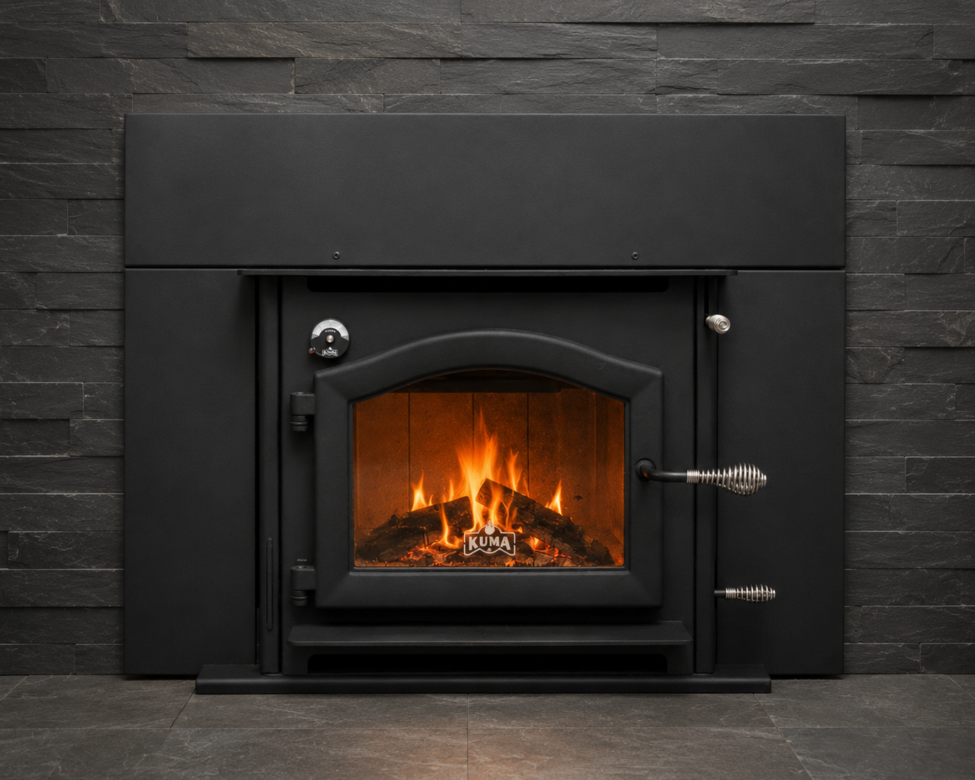 Kuma Alpine LE wood insert with black steel surround and stacked stone wall