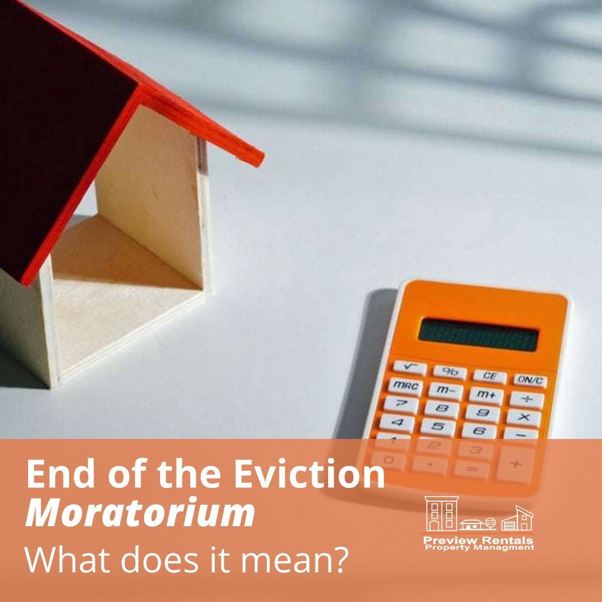 Photo of a home and calculator