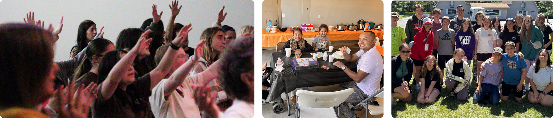 People seated indoors raising hands during a presentation, with a group photo on the right.