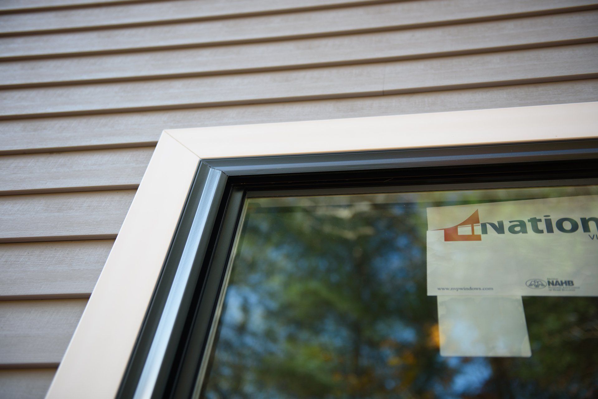 A window with a sign that says nation on it