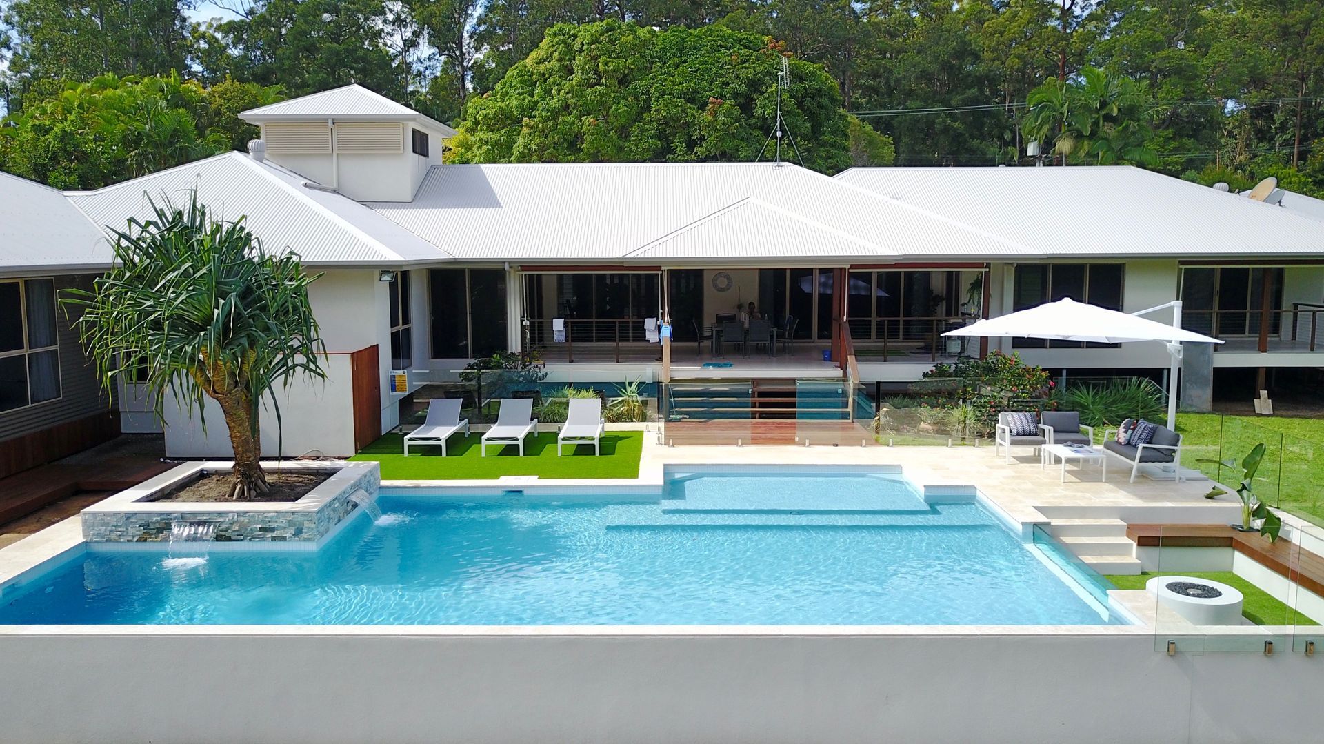 A Large Rectangular Swimming Pool With Stairs Leading to It — Pools By Design in Warana, QLD