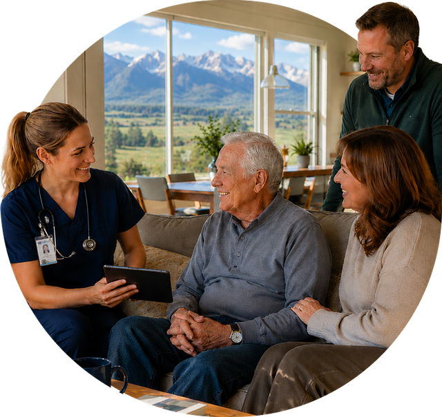 Four people in a cozy room talking, with a mountain view through large windows.