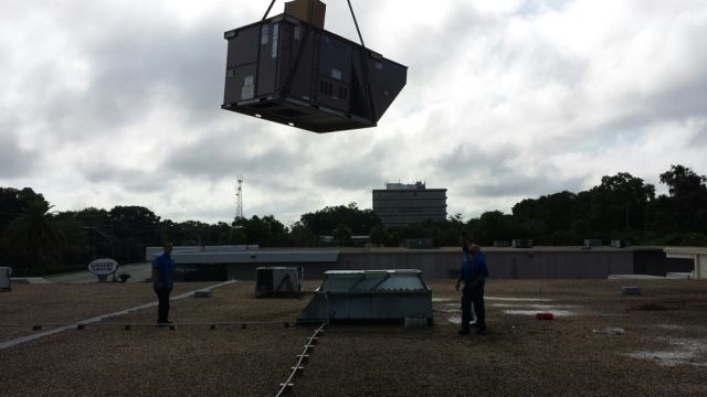 hvac unit lifted in air