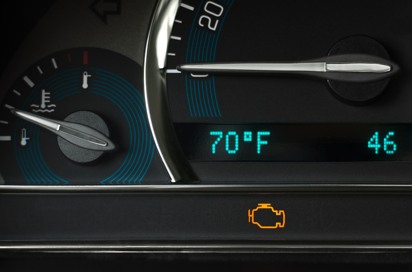 Car dashboard display showing 70°F, 46 miles, and a check engine light illuminated.