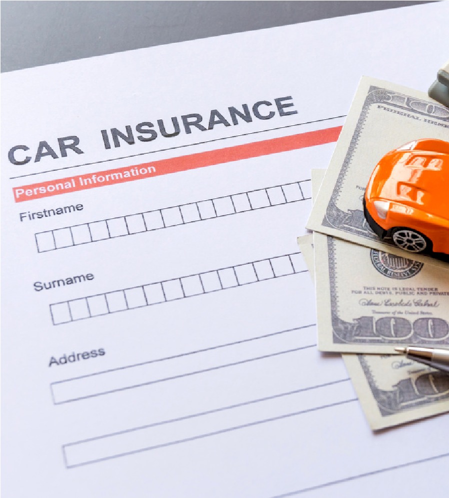 Car insurance form with a toy orange car and cash stacked on top