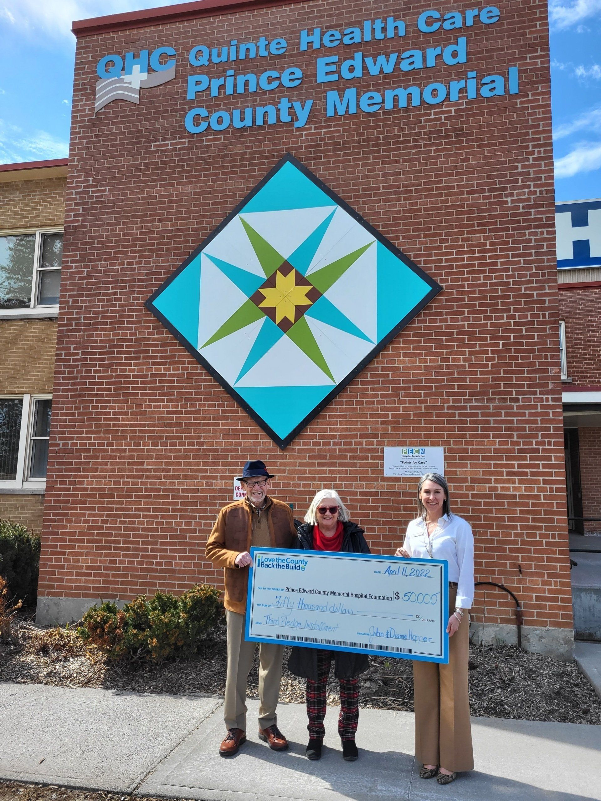 Pictured outside in front of the barn quilt at QHC PECMH from left: John and Dianne Hopper with Shannon Coull, executive director of the PECMH Foundation. Pictured outside in front of the barn quilt at QHC PECMH from left: John and Dianne Hopper with Shannon Coull, executive director of the PECMH Foundation.