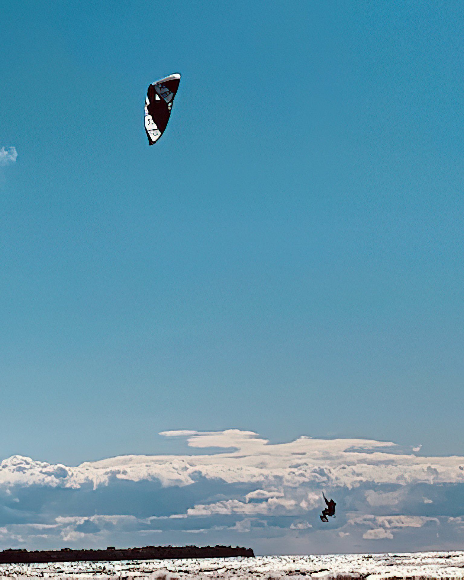 Dr. Chhatwal kiteboarding at Sandbanks