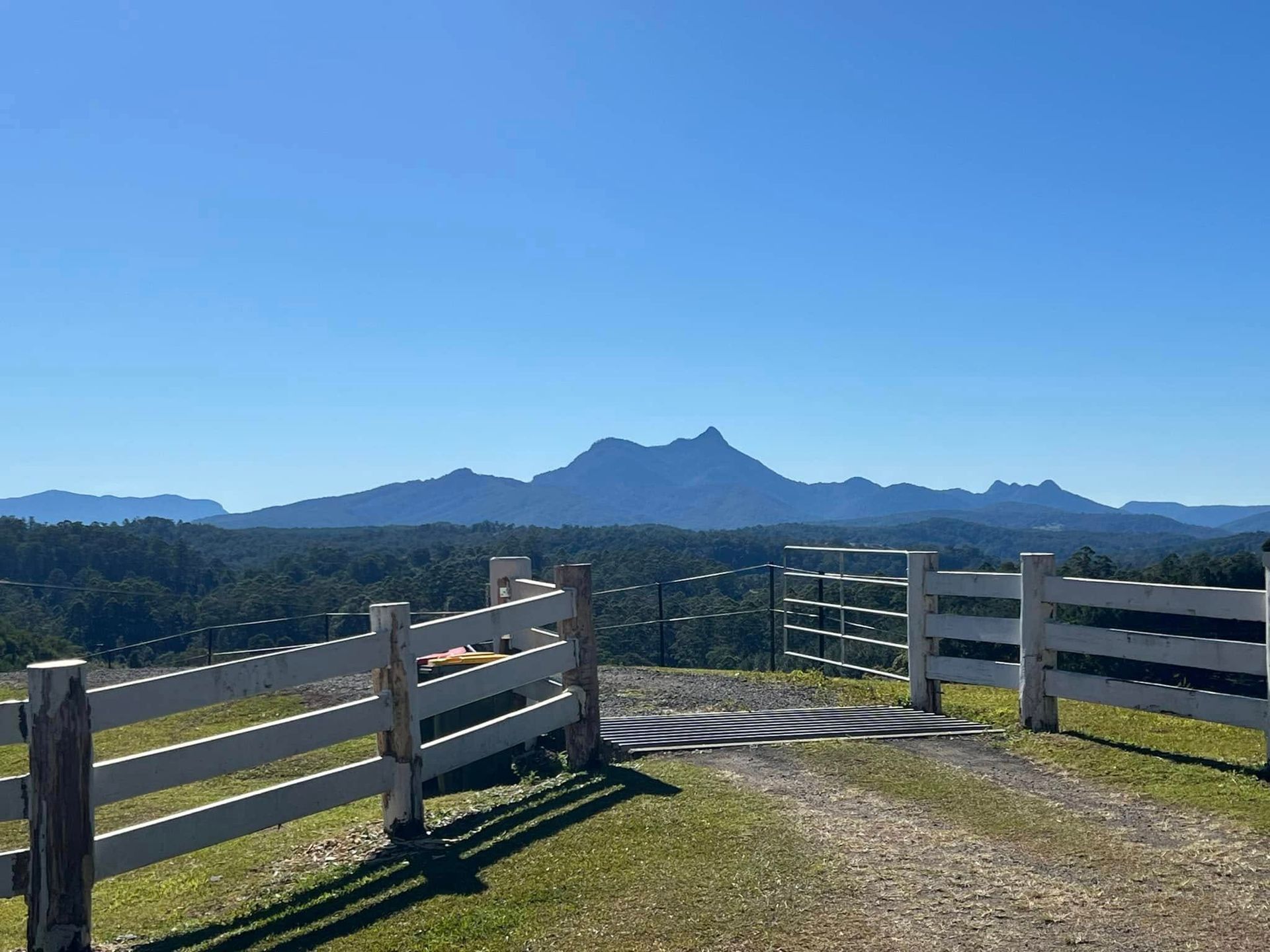 Mountain View From a Fenced Overlook Under a Clear Blue Sky — Northern Rivers Coaching and Counselling In Uki, NSW