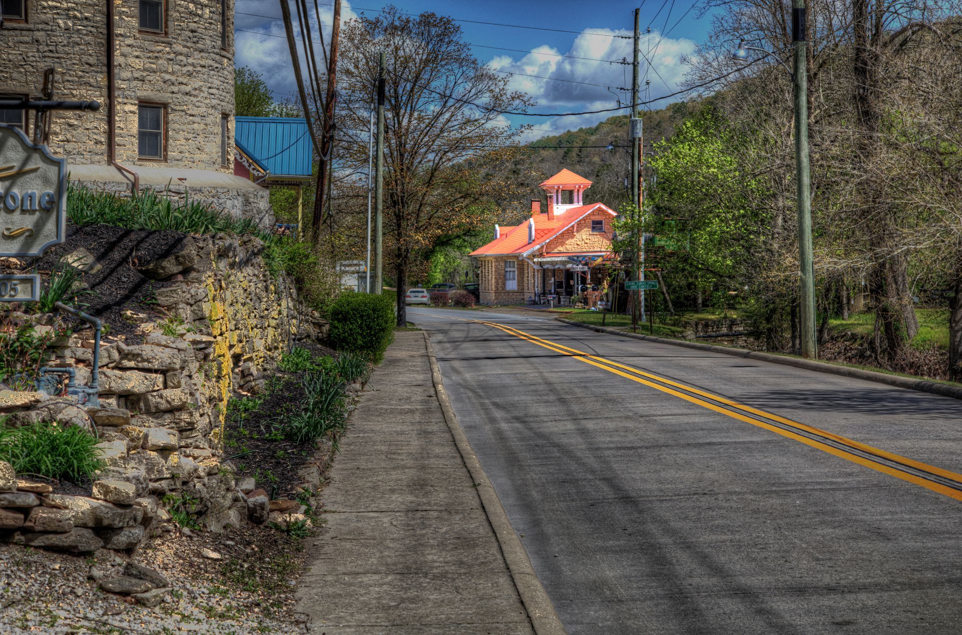a road with a building on the side of it