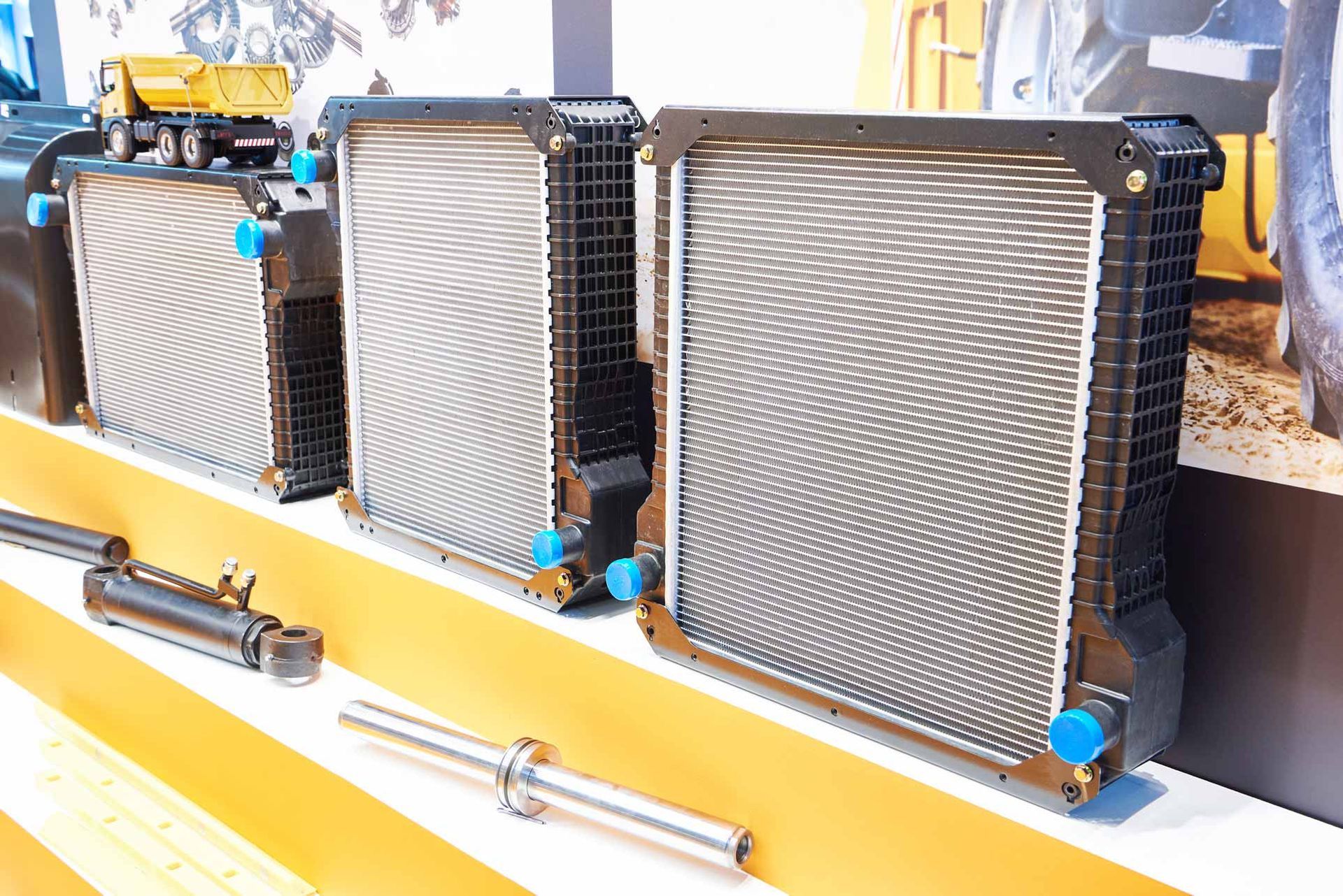 Three radiators for trucks in a store.