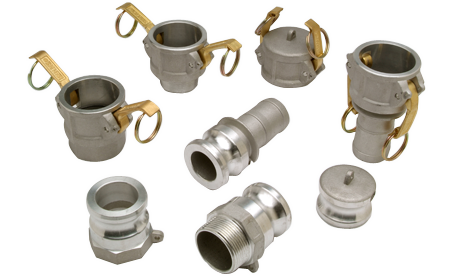 A group of stainless steel fittings on a white background