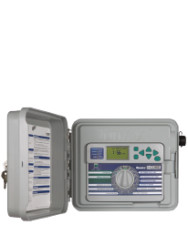 A sprinkler controller with the lid open on a white background.