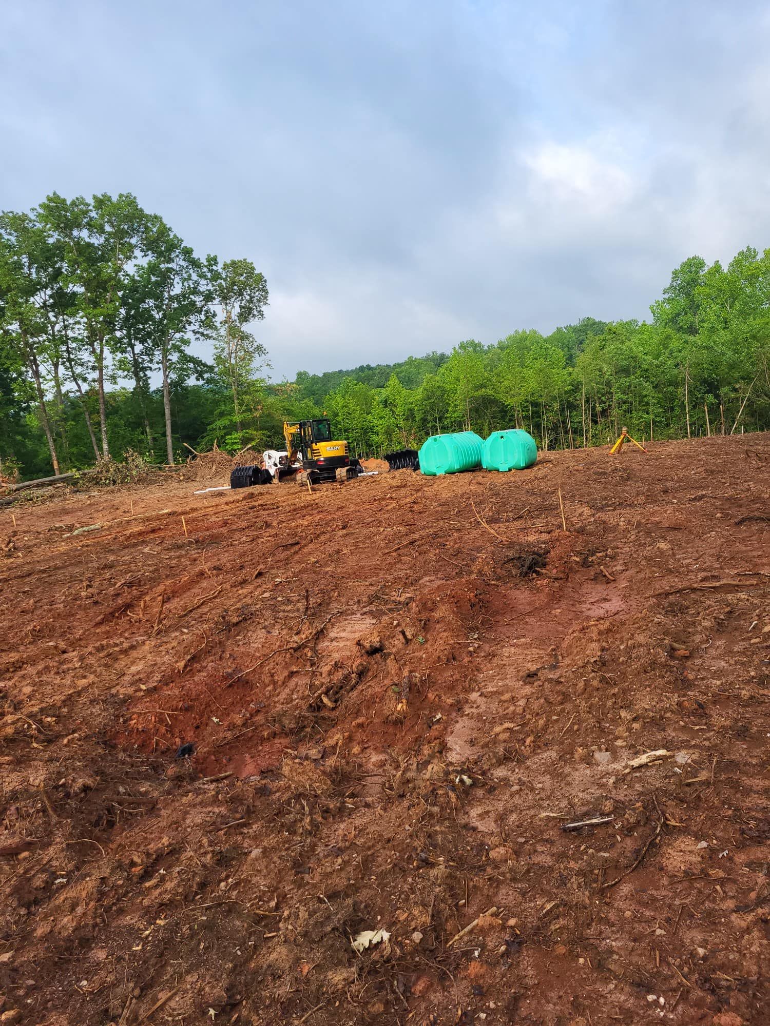 Cleared land with heavy machinery. 