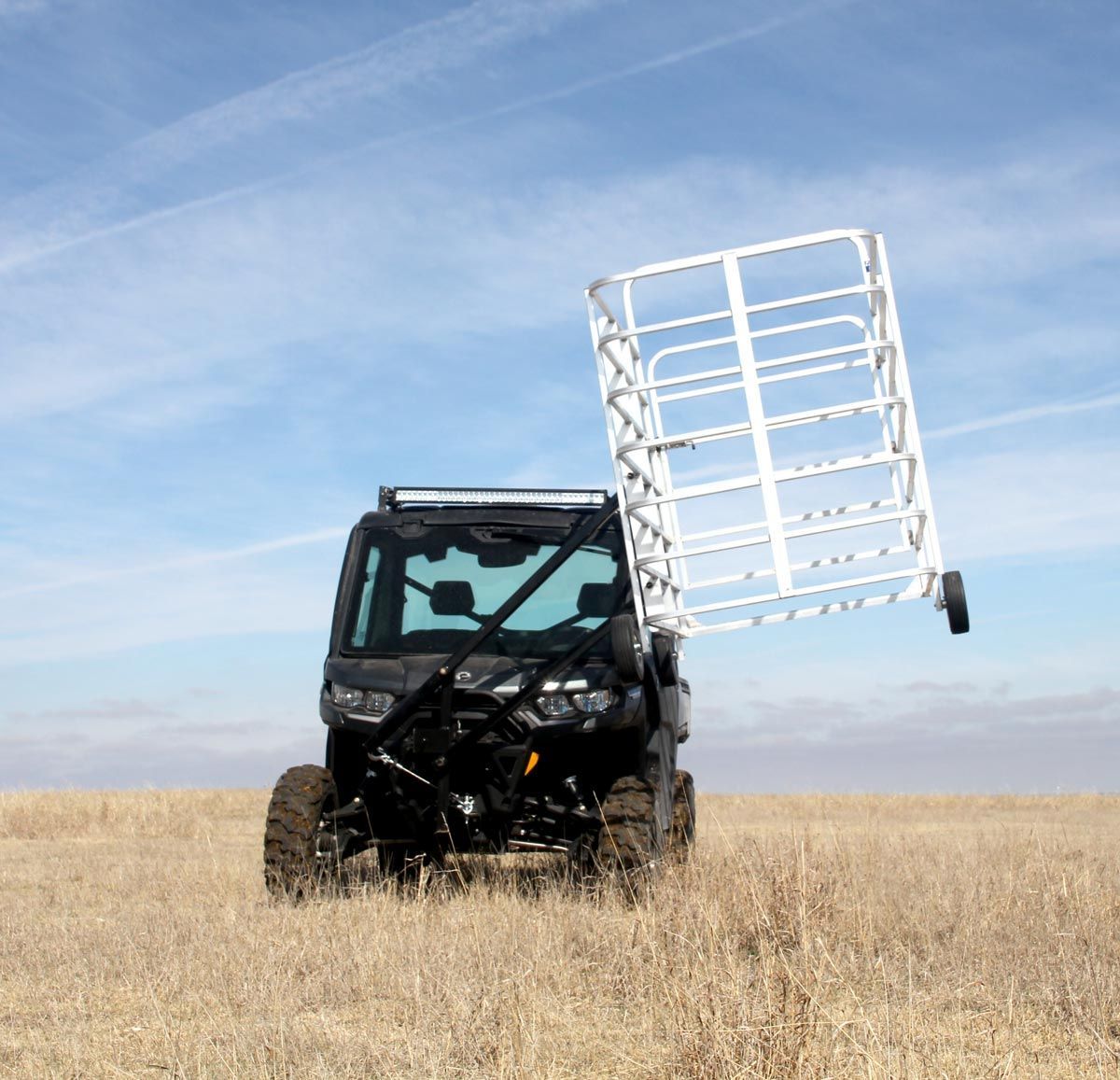 front view of fast catch calf catcher mounted on black utv