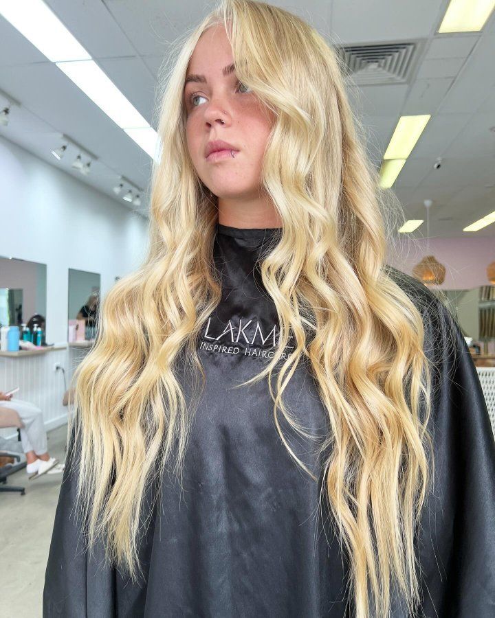 A Woman With Long Blonde Hair — The Hair Boutique Co In Varsity Lakes, QLD