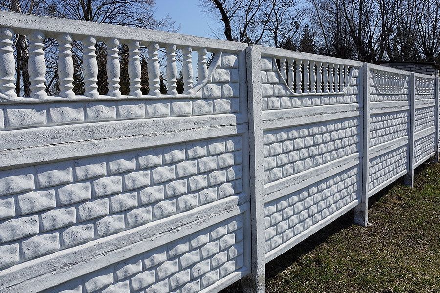 Decorative exterior custom fencing design in white colour