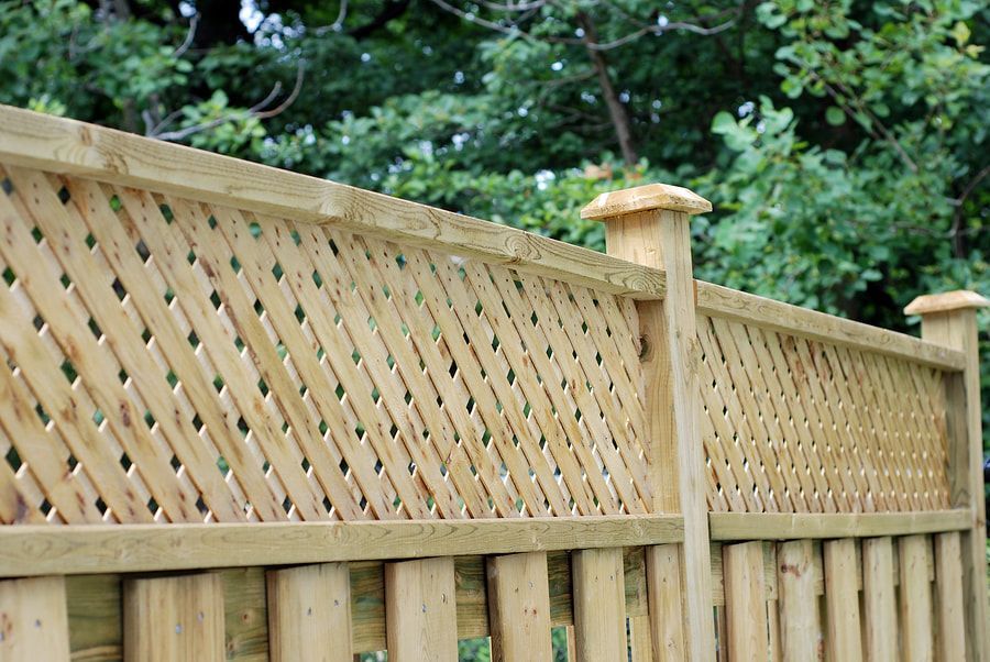 a nice looking wooden fence