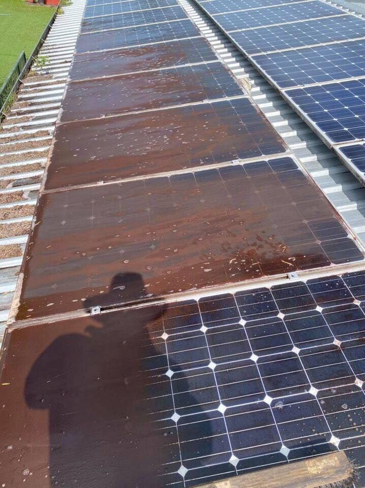 Solar Panels on a Roof, Some Appear Dirty or Stained — Lahtinen Electrical & Refrigeration in Ingham, QLD