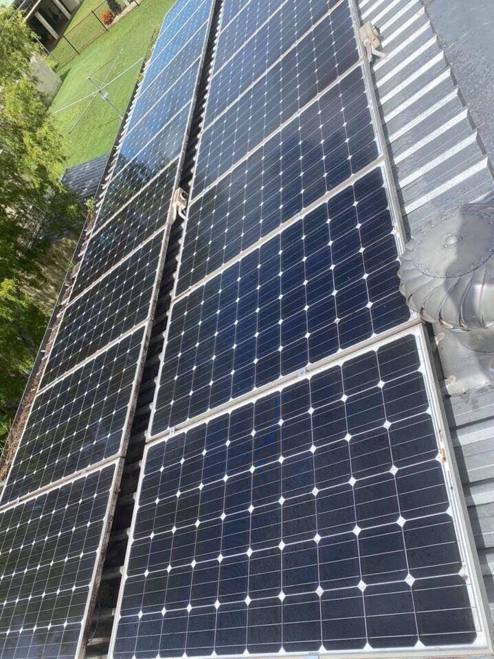 Solar Panels on a Roof, Angled Towards the Sky, Catching Sunlight — Lahtinen Electrical & Refrigeration in Ingham, QLD