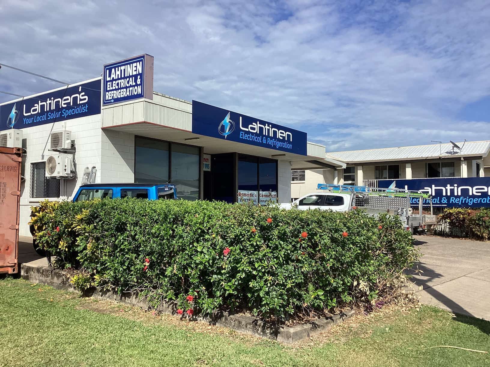 A Business With a Blue Sign "Lahinen's", Surrounded by Bushes — Lahtinen Electrical & Refrigeration in Ingham, QLD