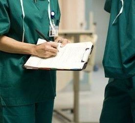 Professionals Completing Medical Job Tasks