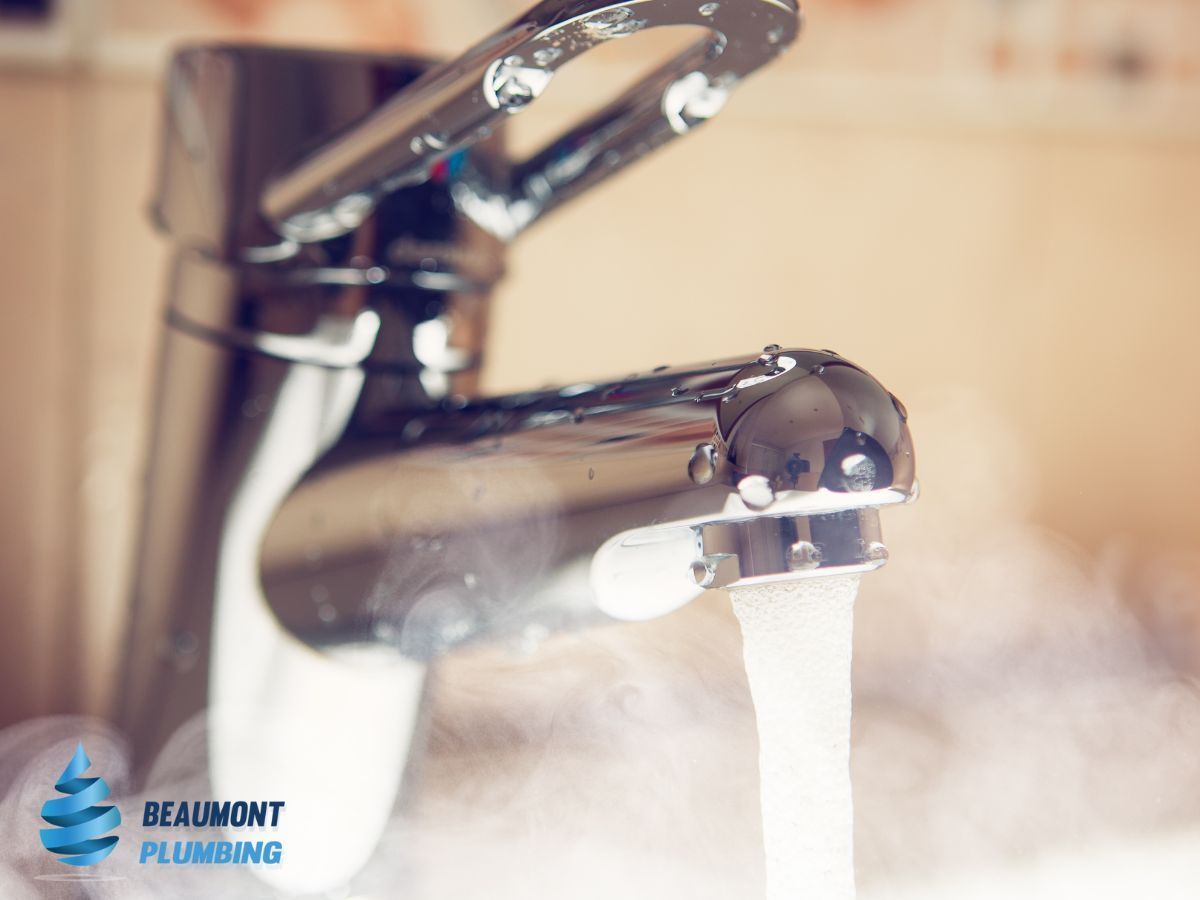 A Close Up of a Faucet With Water Running Out of It — Beaumont Plumbing in Glenfield Park, NSW