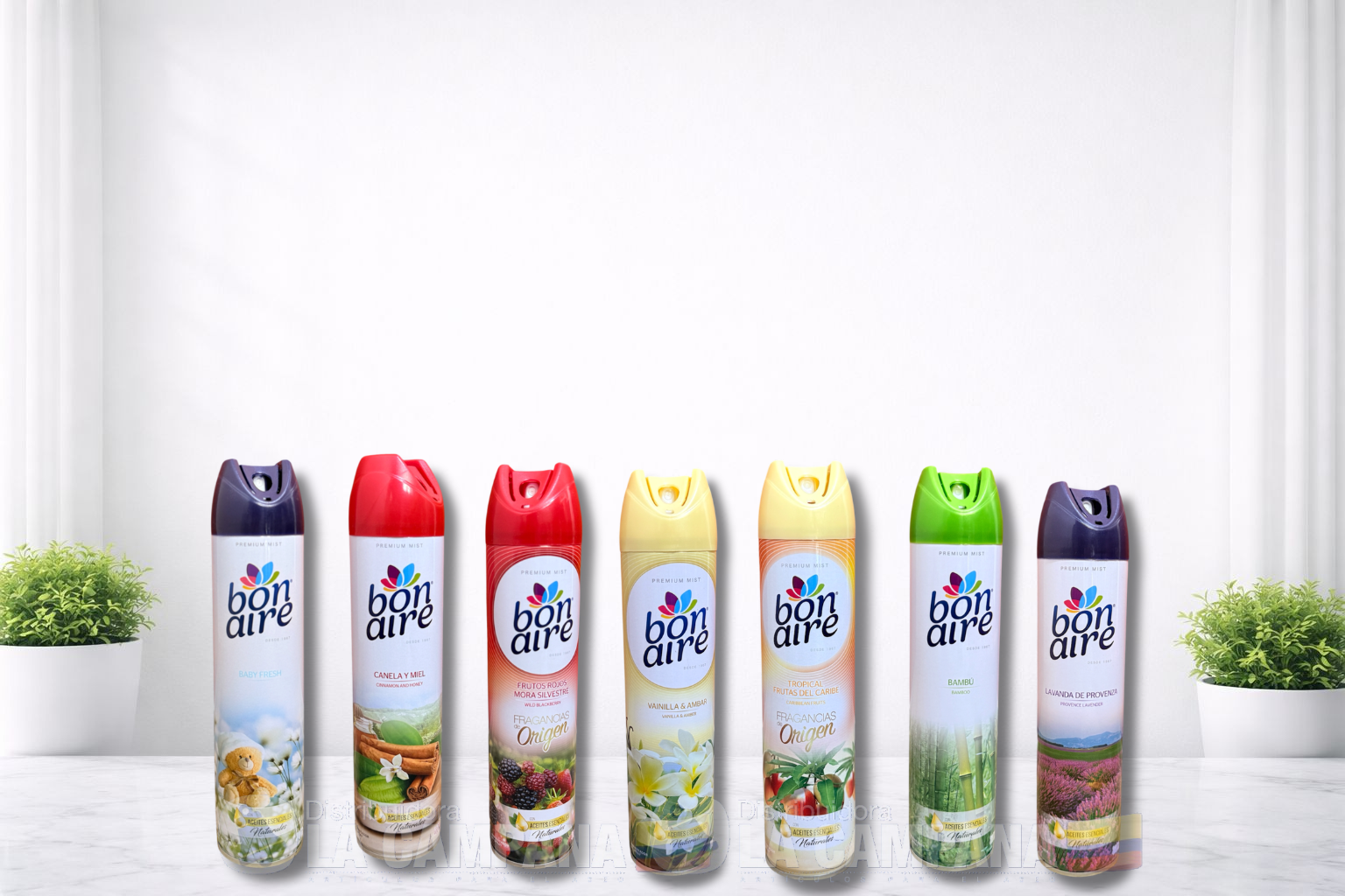 Seven colorful snack canisters lined up on a white surface against a plain white background.