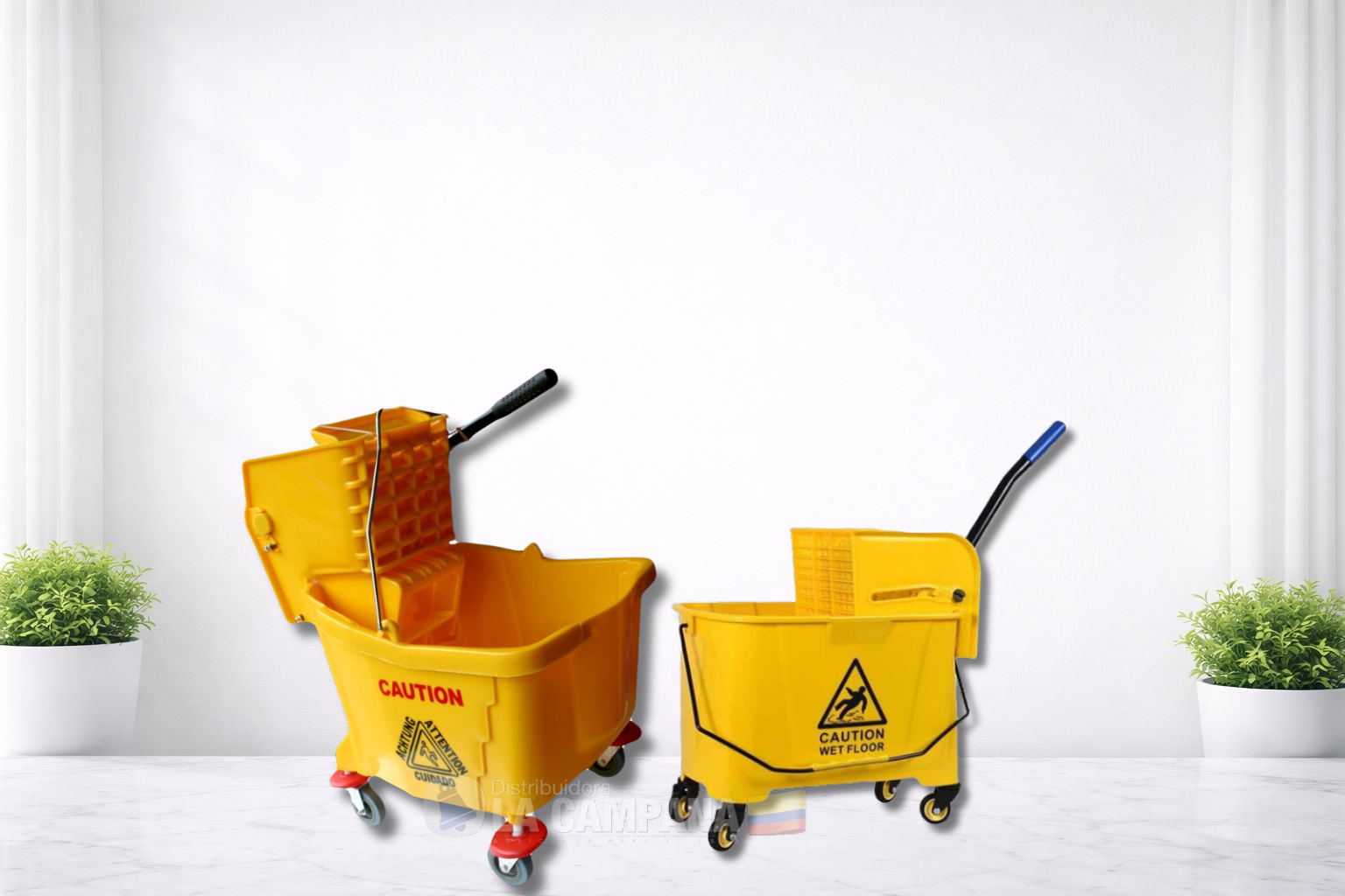 Two yellow mop buckets on casters with wringer and handle, on a white studio floor