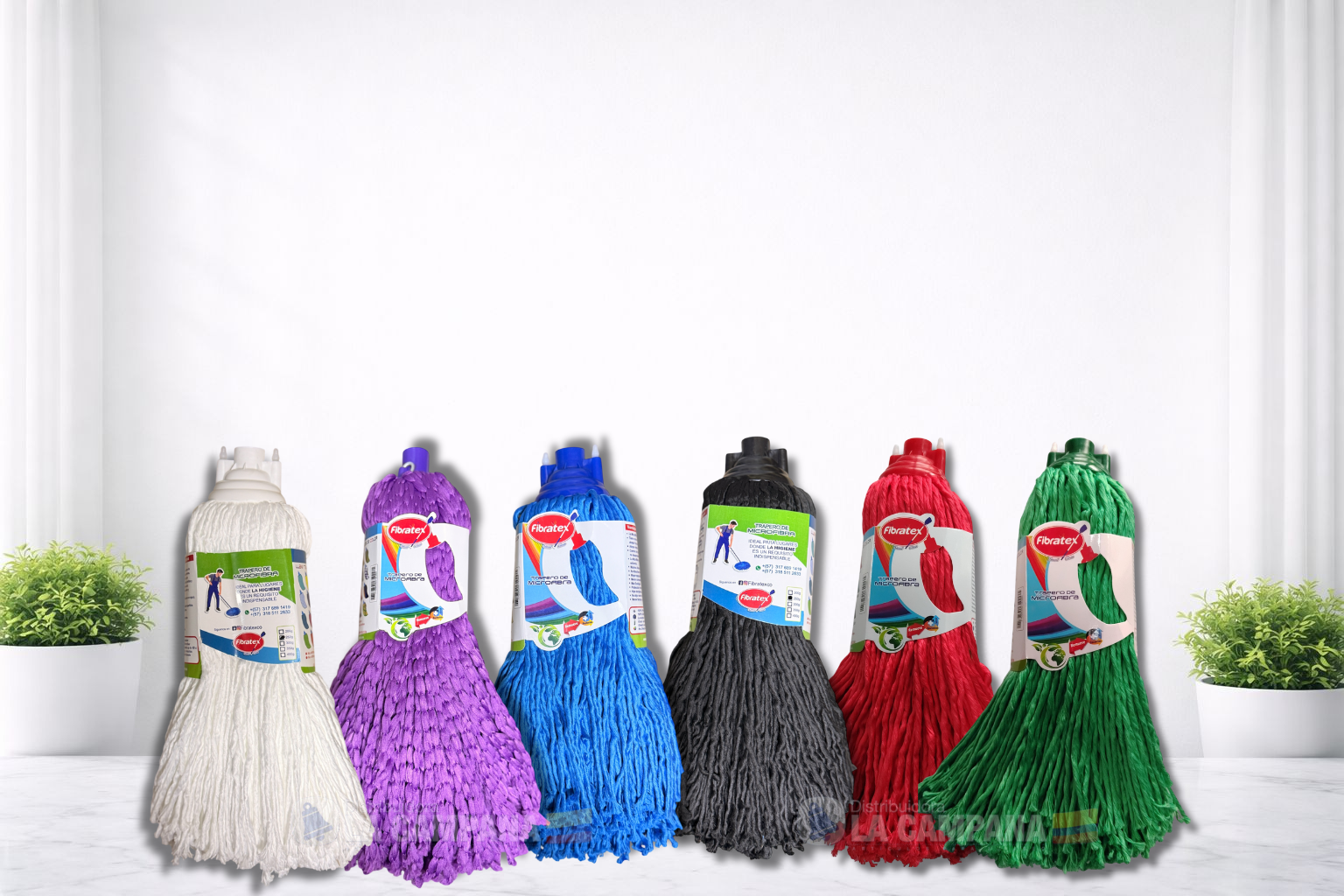 Six colorful hanging mop heads lined up against a white background.